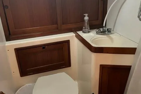 Slide: The Image of Interior of 1977 Fuji 45 MK II Ketch with sink and toilet. - 16