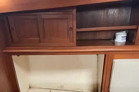 Slide: The Image of Interior of 1977 Fuji 45 MK II Ketch with wooden cabinets. - 22