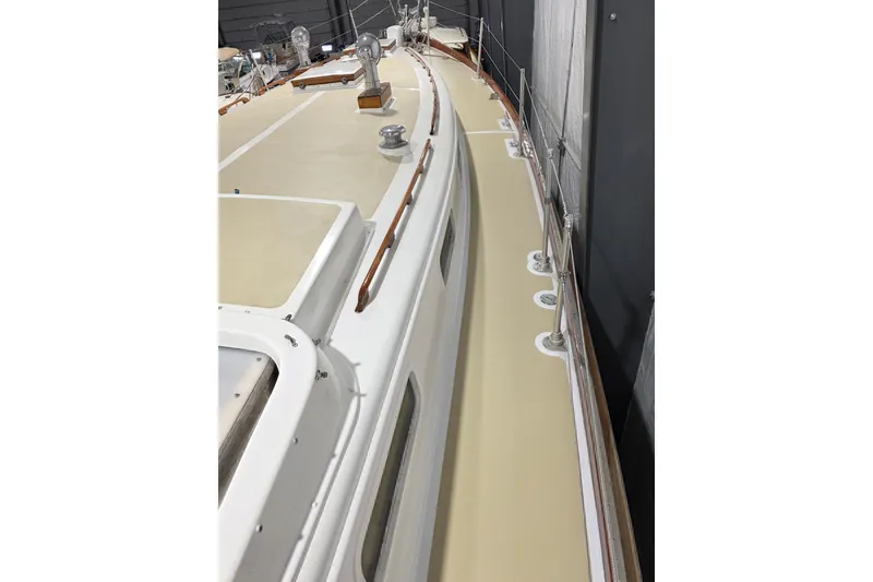 Slide: The Image of Deck view of 1977 Fuji 45 MK II Ketch sailboat in a storage facility. - 31