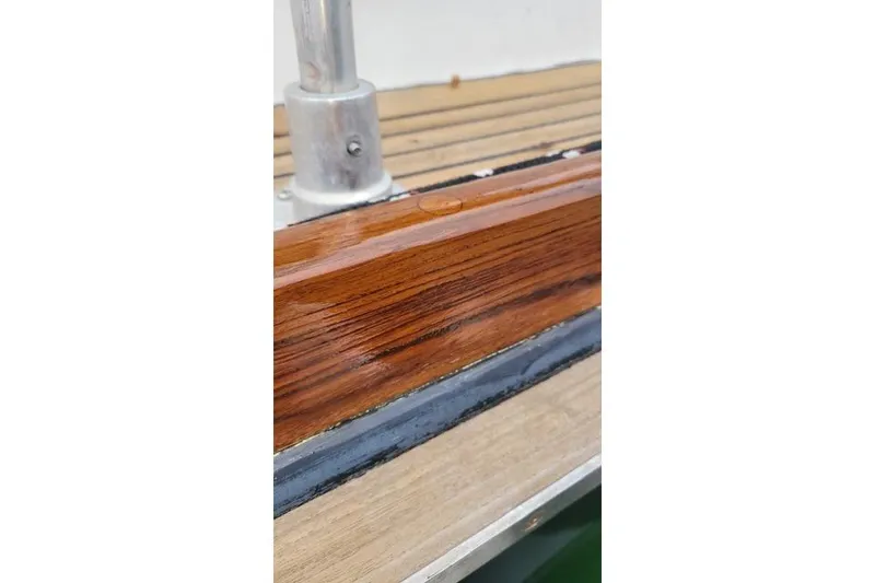 Slide: The Image of Close-up of polished wood detail on 1977 Fuji 45 MK II Ketch sailboat. - 37