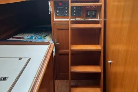 Slide: The Image of Interior of 1977 Fuji 45 MK II Ketch with wooden cabinetry. - 9
