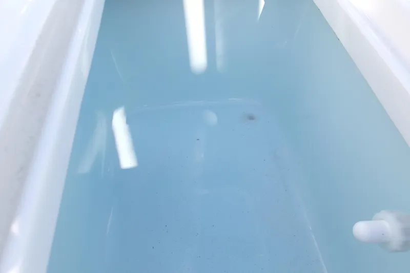 Slide: The Image of Interior view of a 2026 Key West 1720 Center Console boat's storage compartment. - 7