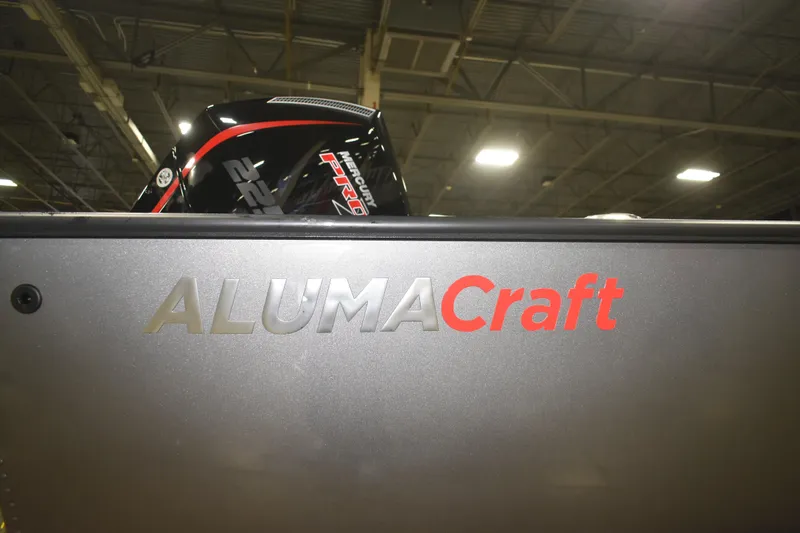 Slide: The Image of 2026 Alumacraft Competitor 195X Sport boat with Mercury Pro engine in showroom. - 15