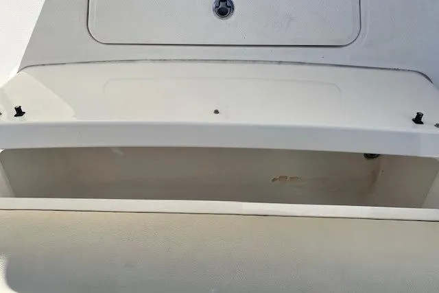 Slide: The Image of Storage compartment of 2018 Everglades 335 Center Console boat, open and empty. - 43