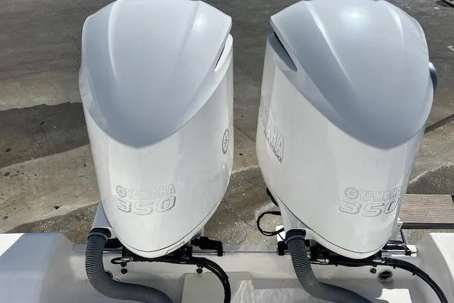 Slide: The Image of Twin Yamaha 350 outboard engines on a 2018 Everglades 335 Center Console boat. - 6