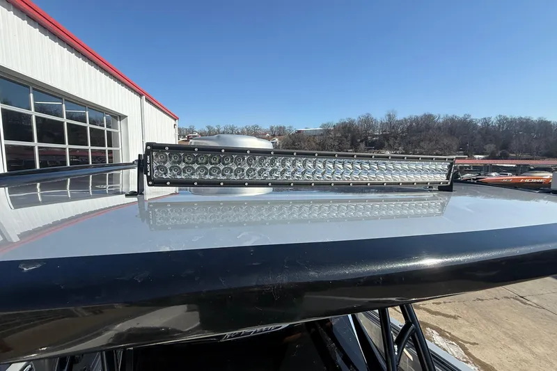 Slide: The Image of 2023 Nor-Tech 390 Sport Center Console with LED light bar on roof. - 14