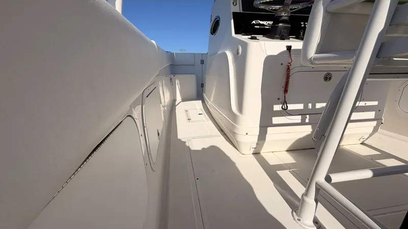 Slide: The Image of Interior view of a 2006 Dakota 36 Cuddy boat deck. - 7