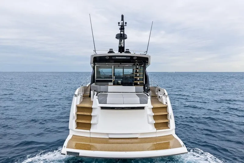 Slide: The Image of 2022 Sunseeker 65 Sport Yacht on open sea, rear view. - 20