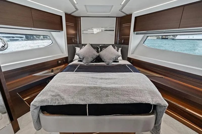 Slide: The Image of Luxurious bedroom interior of 2022 Sunseeker 65 Sport Yacht with elegant design and waterfront views. - 26