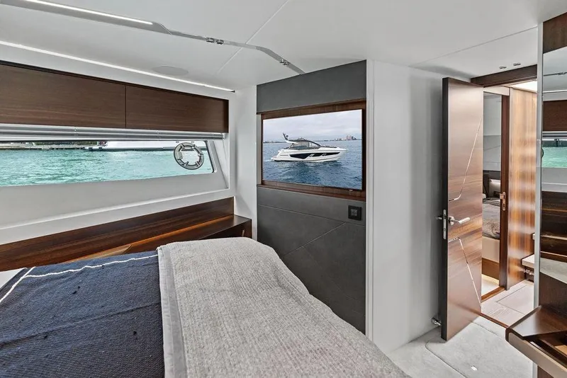 Slide: The Image of Luxurious interior of 2022 Sunseeker 65 Sport Yacht with ocean view. - 27