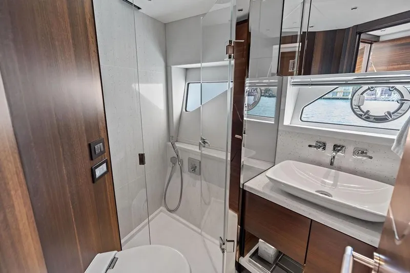 Slide: The Image of Luxurious bathroom in 2022 Sunseeker 65 Sport Yacht with modern fixtures and elegant design. - 29