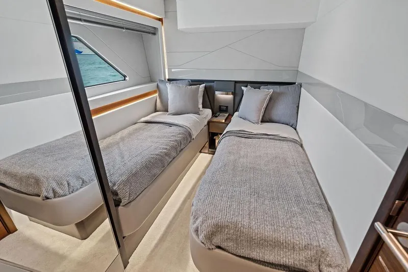 Slide: The Image of Interior of 2022 Sunseeker 65 Sport Yacht with twin beds and modern design. - 33