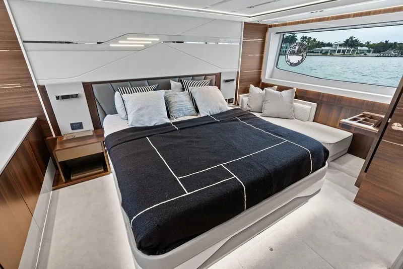 Slide: The Image of Luxurious bedroom interior of 2022 Sunseeker 65 Sport Yacht with modern design and waterfront view. - 39