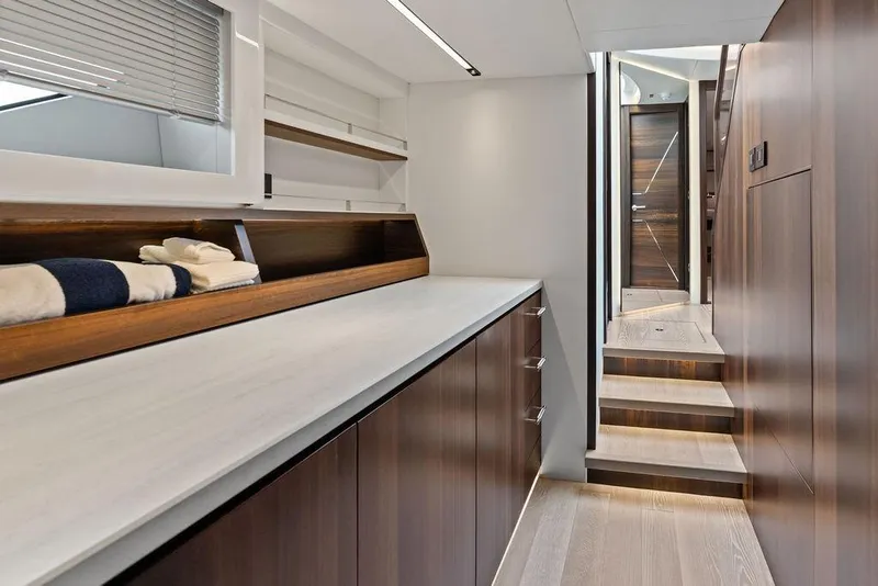 Slide: The Image of Luxurious interior of 2022 Sunseeker 65 Sport Yacht with sleek wood finishes and modern design. - 44