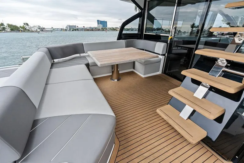 Slide: The Image of Luxurious 2022 Sunseeker 65 Sport Yacht with elegant seating and modern design. - 54