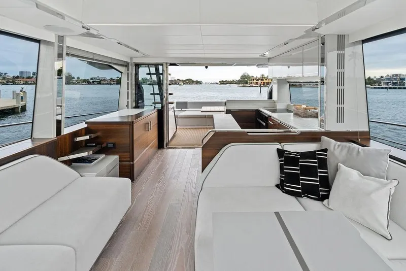Slide: The Image of Luxurious interior of 2022 Sunseeker 65 Sport Yacht with modern furnishings and waterfront view. - 67