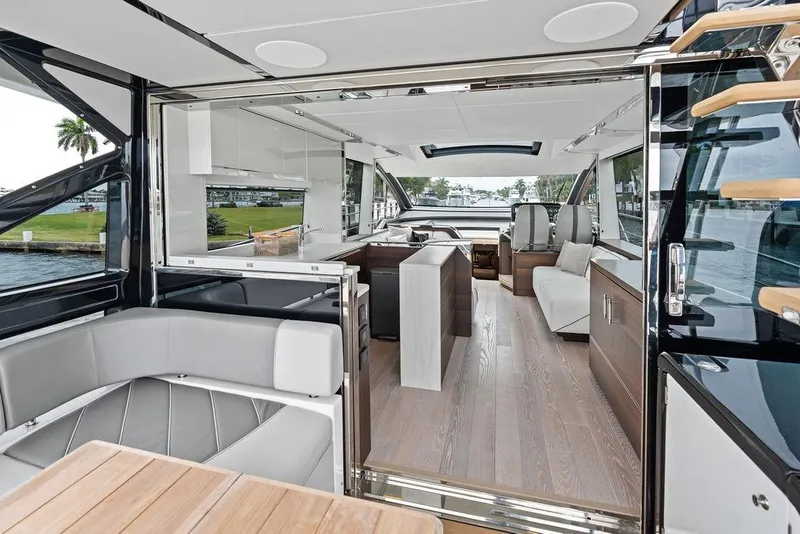 Slide: The Image of Luxurious interior of 2022 Sunseeker 65 Sport Yacht with modern seating and sleek design. - 68