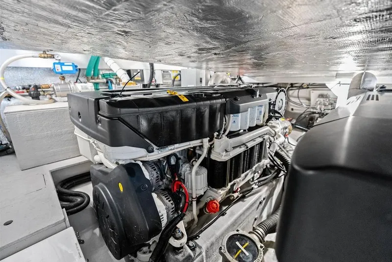 Slide: The Image of Engine room of 2022 Sunseeker 65 Sport Yacht showcasing advanced machinery. - 83