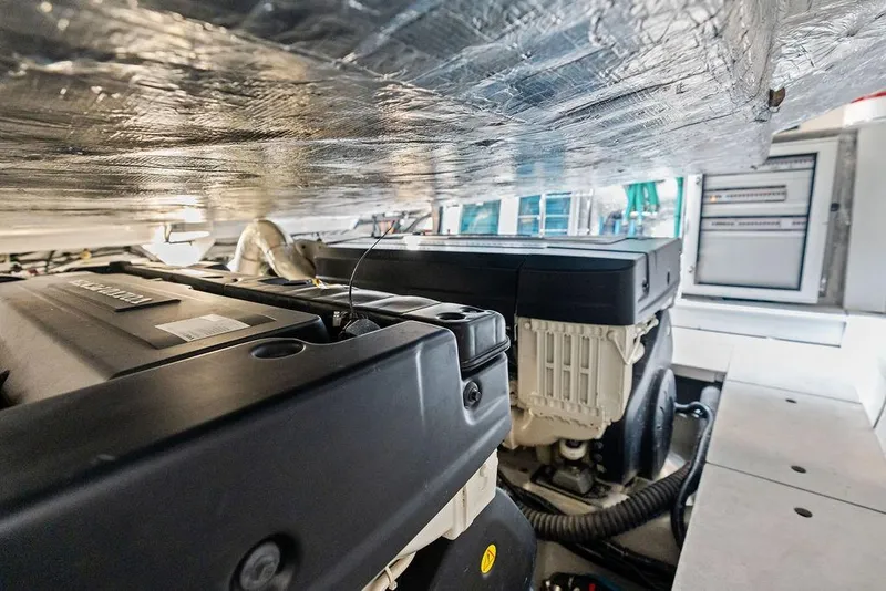 Slide: The Image of Engine room of 2022 Sunseeker 65 Sport Yacht, showcasing advanced machinery and equipment. - 85