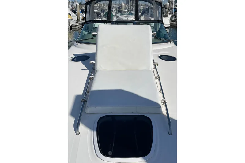 Slide: The Image of 2007 Sea Ray 340 Sundancer boat with sunpad and hatch on deck. - 15