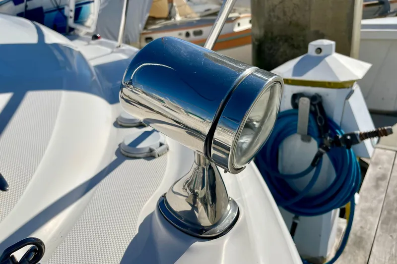 Slide: The Image of Close-up of a 2007 Sea Ray 340 Sundancer spotlight on deck, dockside view. - 18