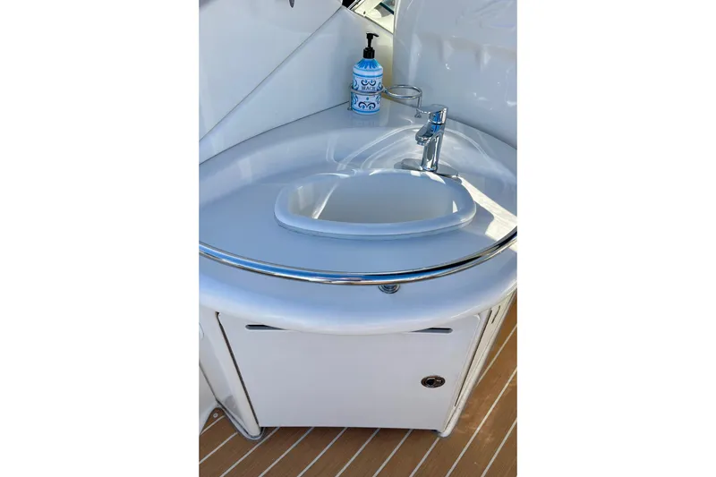 Slide: The Image of 2007 Sea Ray 340 Sundancer boat sink with faucet and soap dispenser. - 23