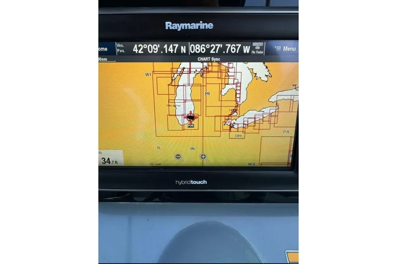 Slide: The Image of Raymarine GPS display showing coordinates on a 2014 Formula 310 Bowrider boat. - 8