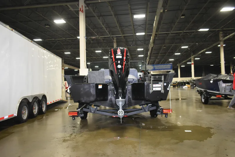 Slide: The Image of 2026 Alumacraft Competitor 185X Sport boat displayed indoors, rear view. - 3