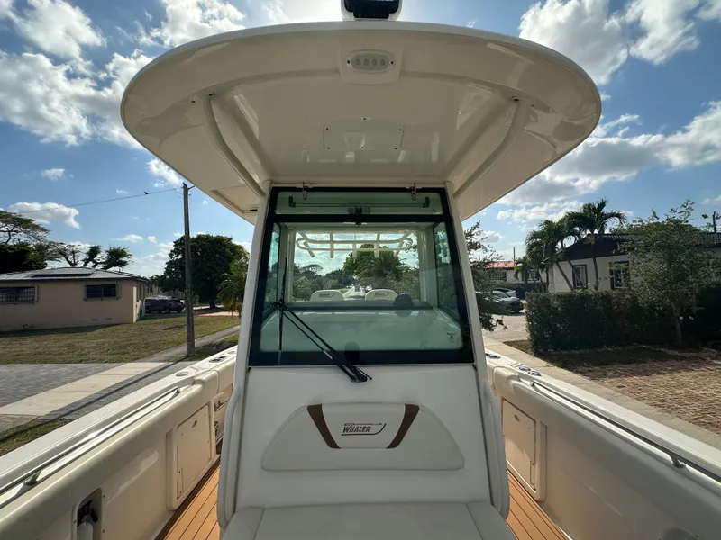 Slide: The Image of Boston Whaler 320 Outrage 2013, boat roof view in sunny weather. - 19
