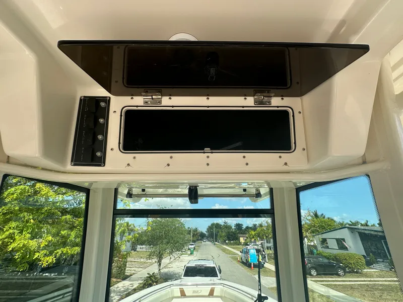 Slide: The Image of Interior view of a 2013 Boston Whaler 320 Outrage boat. - 25