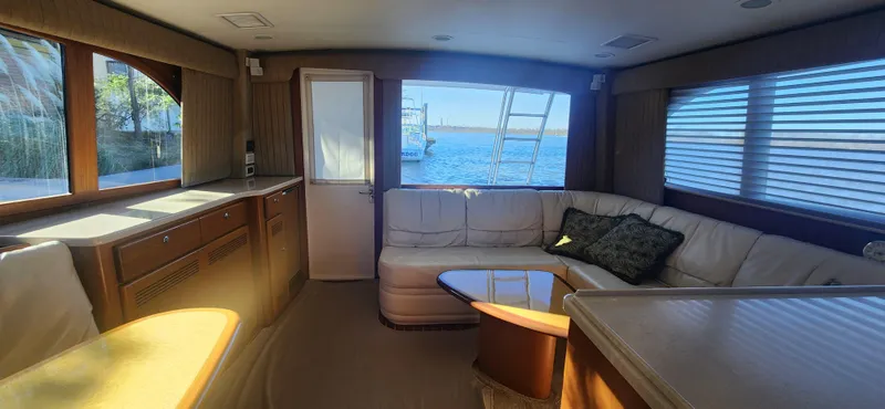 Slide: The Image of Luxurious interior of 2004 Cabo 48 Convertible yacht with ocean view. - 15