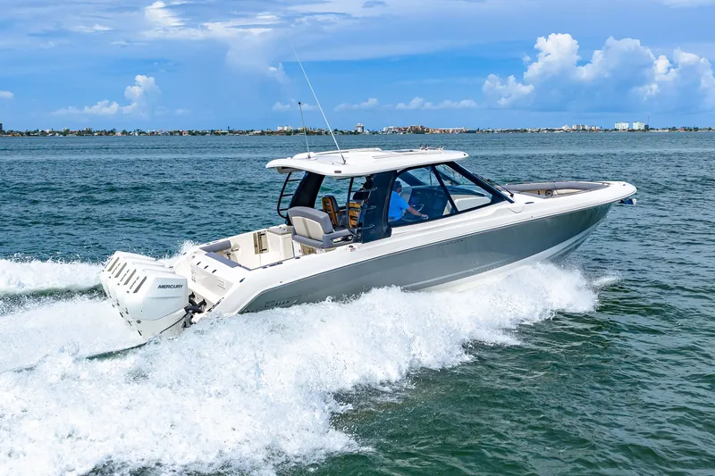 Slide: The Image of 2026 Boston Whaler 380 Realm on the water, featuring sleek design and powerful engine. - 31