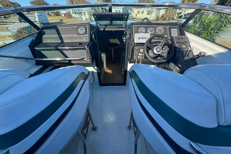 Slide: The Image of 1989 Formula 292 SR-1 boat cockpit with steering wheel and dashboard controls. - 26