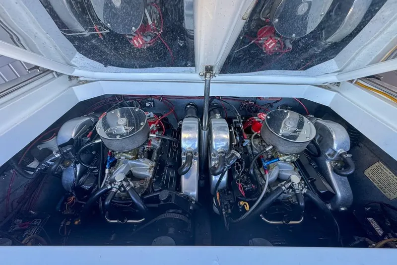 Slide: The Image of Twin engines in a 1989 Formula 292 SR-1 boat, showcasing detailed components. - 35