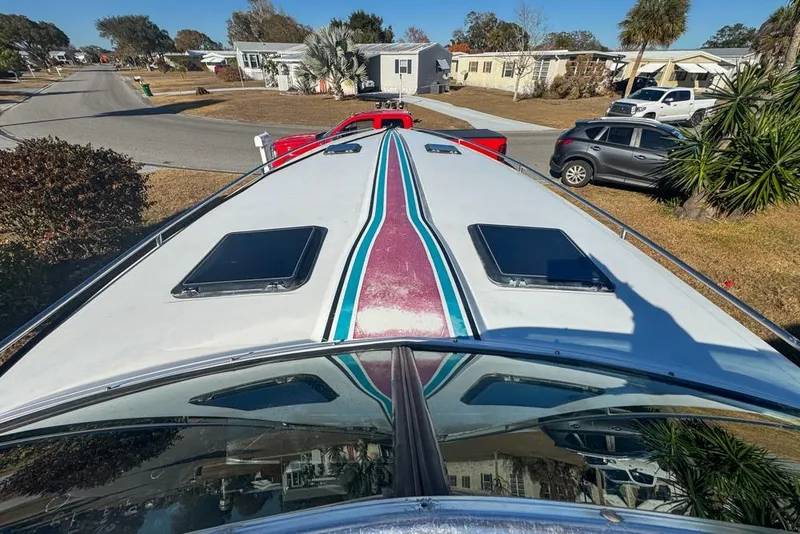 Slide: The Image of 1989 Formula 292 SR-1 boat on trailer in residential neighborhood. - 37