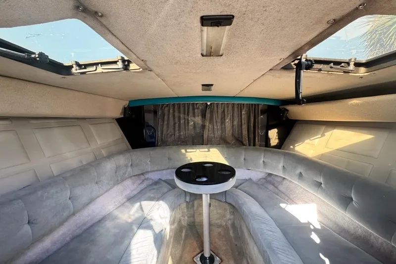 Slide: The Image of 1989 Formula 292 SR-1 boat interior with plush seating and skylights. - 50