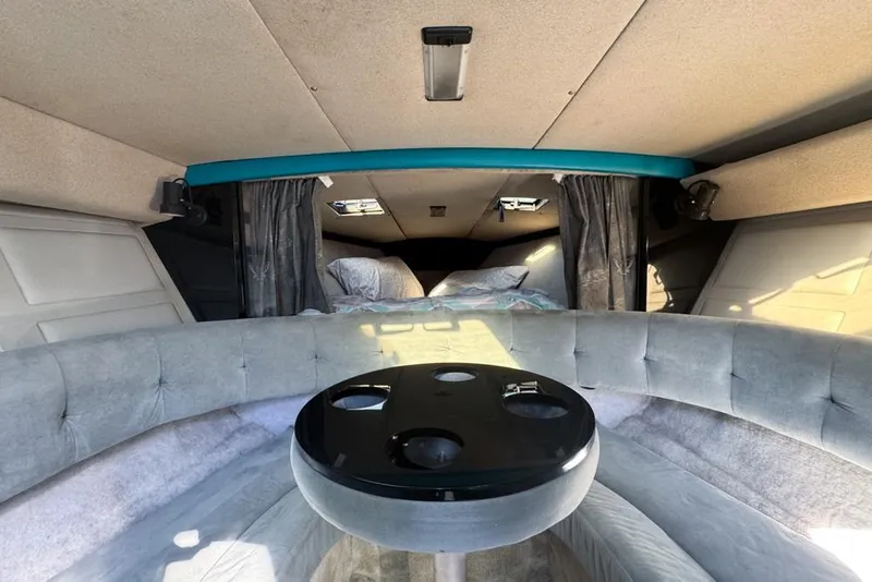 Slide: The Image of Interior of 1989 Formula 292 SR-1 boat with plush seating and round table. - 53