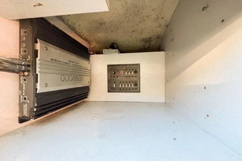 Slide: The Image of 1989 Formula 292 SR-1 interior with Kenwood amplifier and control panel. - 67