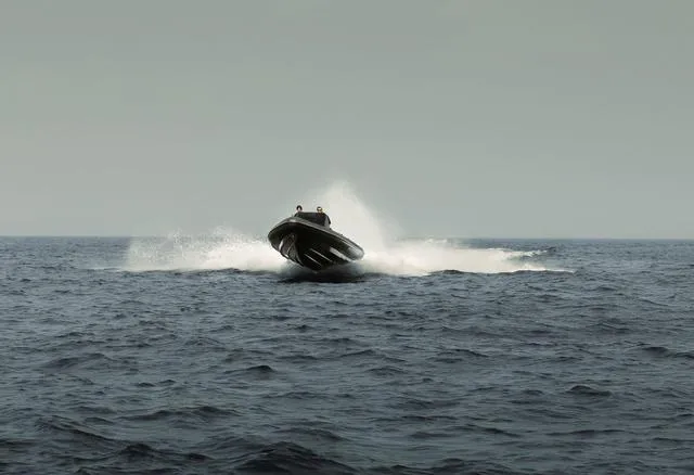 Slide: The Image of Roughneck RIB 1010 boat speeding on open sea, 2022 model. - 22
