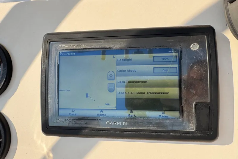 Slide: The Image of Garmin GPSMAP 741xs on 2015 Cobia 201 Center Console boat dashboard. - 11