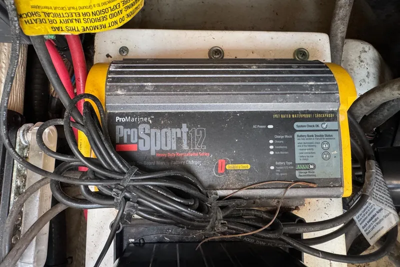 Slide: The Image of ProMariner ProSport 12 battery charger in a 2015 Cobia 201 Center Console boat. - 30