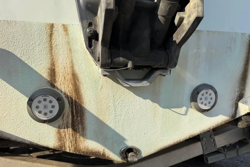 Slide: The Image of 2015 Cobia 201 Center Console boat transom with underwater lights and motor mount. - 39