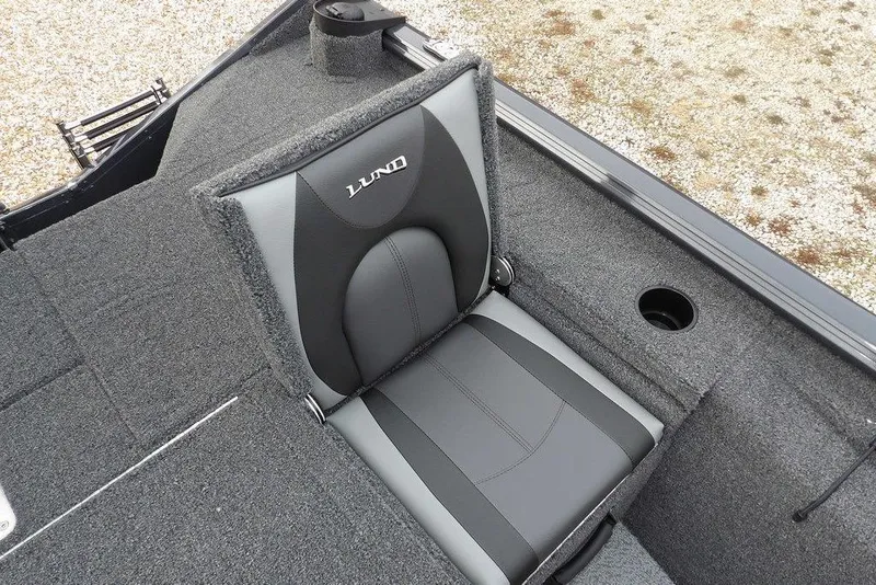 Slide: The Image of 2026 Lund 1875 Renegade boat seat with gray upholstery and cup holder. - 12