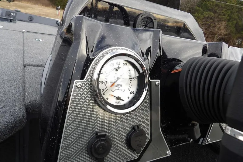 Slide: The Image of 2026 Lund 1875 Renegade dashboard with speedometer and fuel gauge, featuring sleek design. - 23