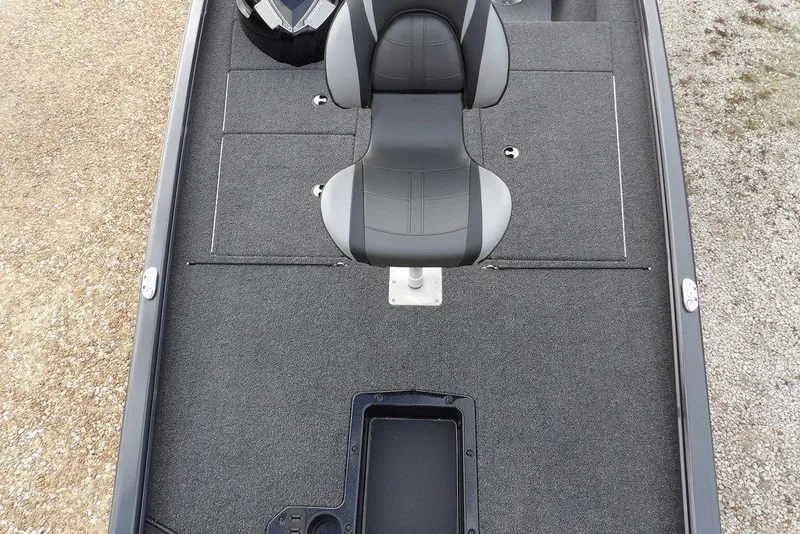 Slide: The Image of 2026 Lund 1875 Renegade boat interior with gray seating and carpeted deck. - 35