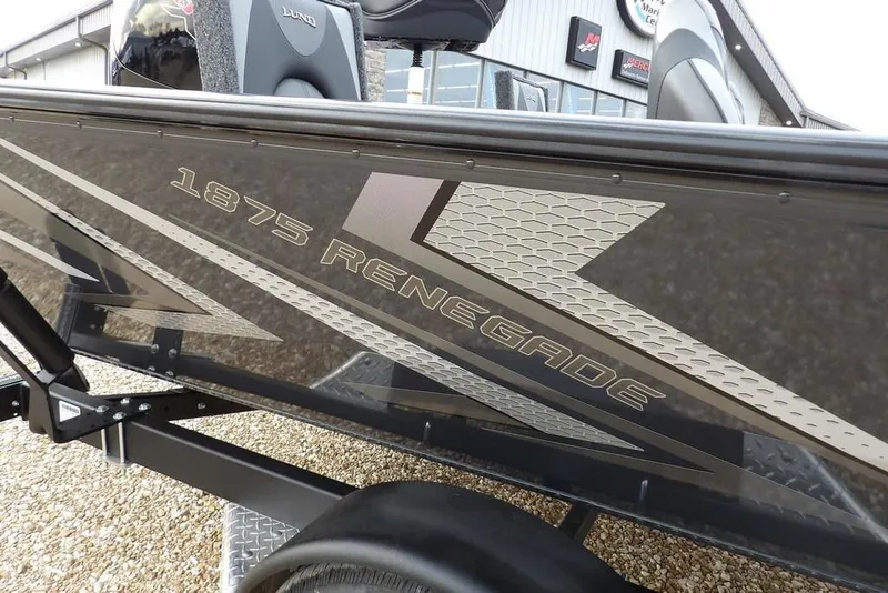 Slide: The Image of 2026 Lund 1875 Renegade boat with sleek design and bold graphics. - 44