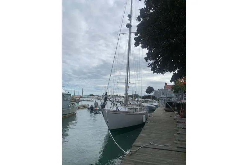 Slide: The Image of Sailboat docked at marina, Bristol 40, 1973 model, overcast sky. - 10