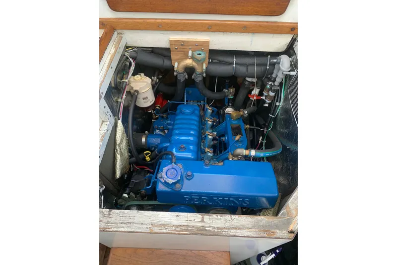 Slide: The Image of 1973 Bristol 40 engine compartment with blue Perkins marine engine. - 5