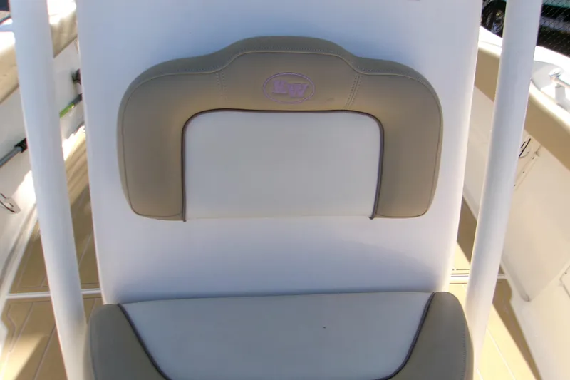 Slide: The Image of 2020 Key West 239 FS boat seat with beige and white upholstery. - 12