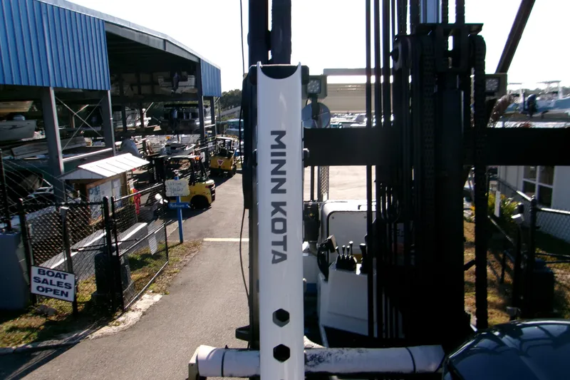 Slide: The Image of Boat sales area with Minn Kota equipment, featuring 2020 Key West 239 FS model. - 15